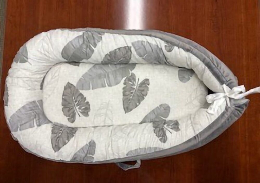 Momaid Infant Loungers Linked to Deadly Suffocation Risk